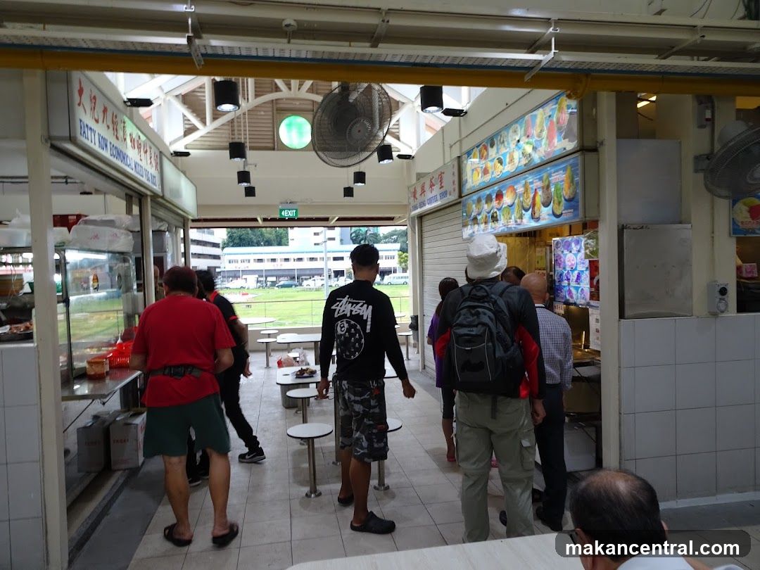 Food court interior with customers and stalls