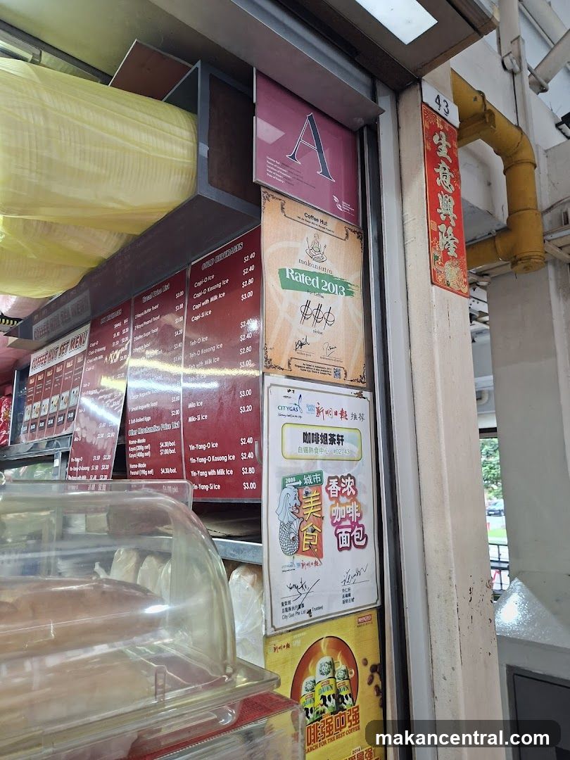 Shop Front with Menu Boards and Promotional Posters