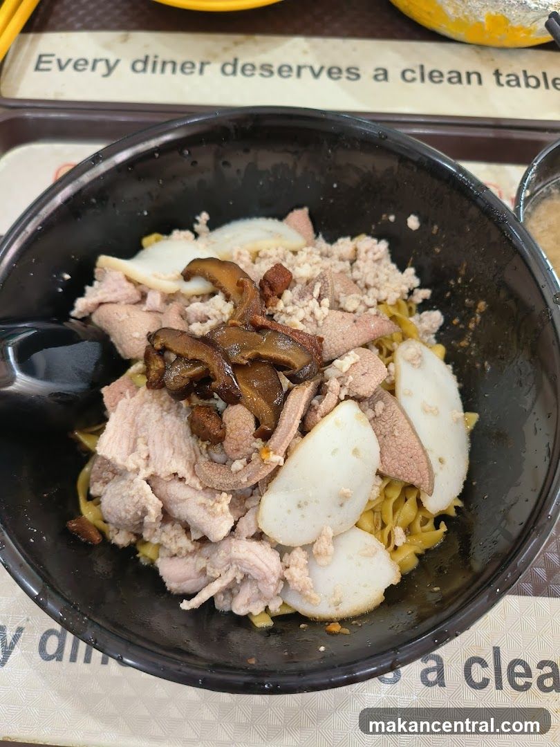 Noodle dish in black bowl