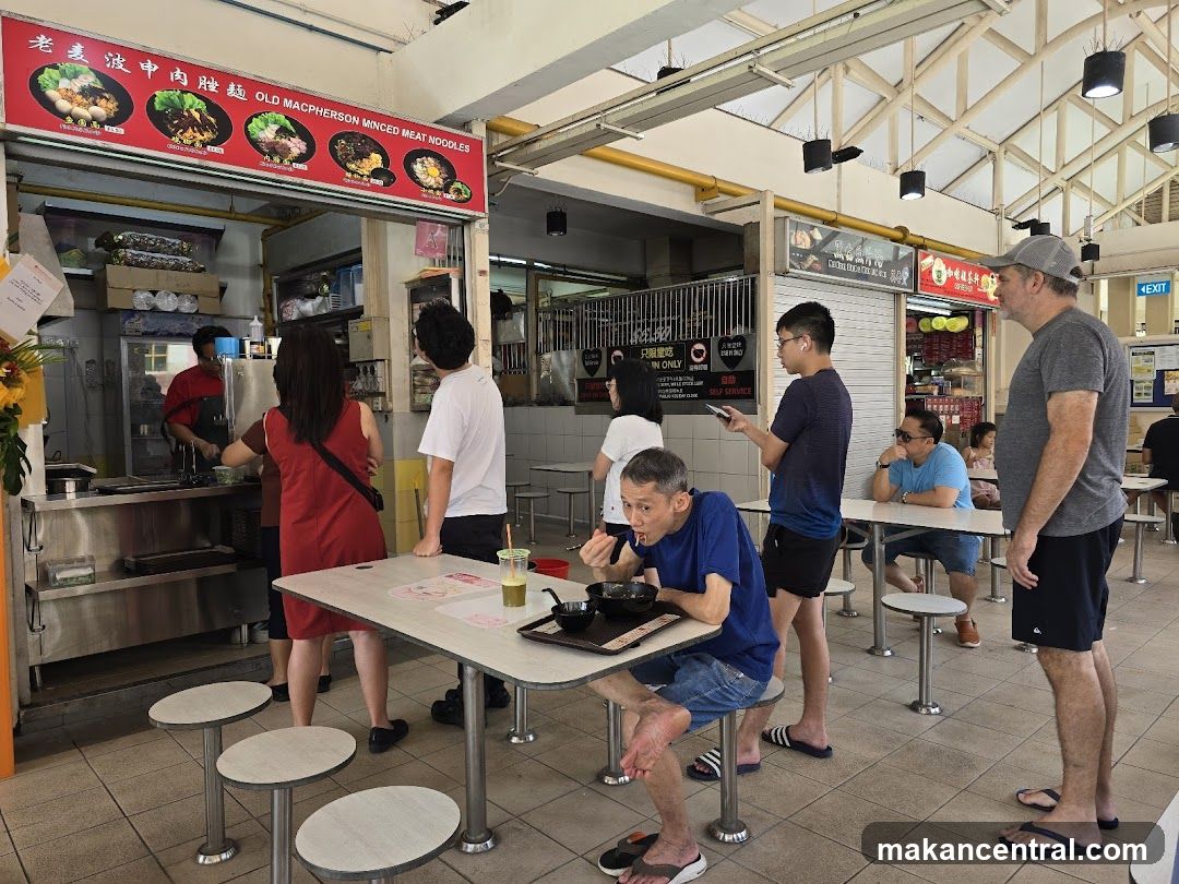 Food court interior with customers and vendors