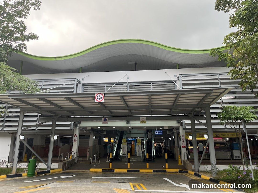 Entrance to a public transit station with commercial stalls