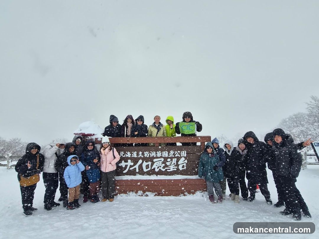 Group photo at snowy viewpoint