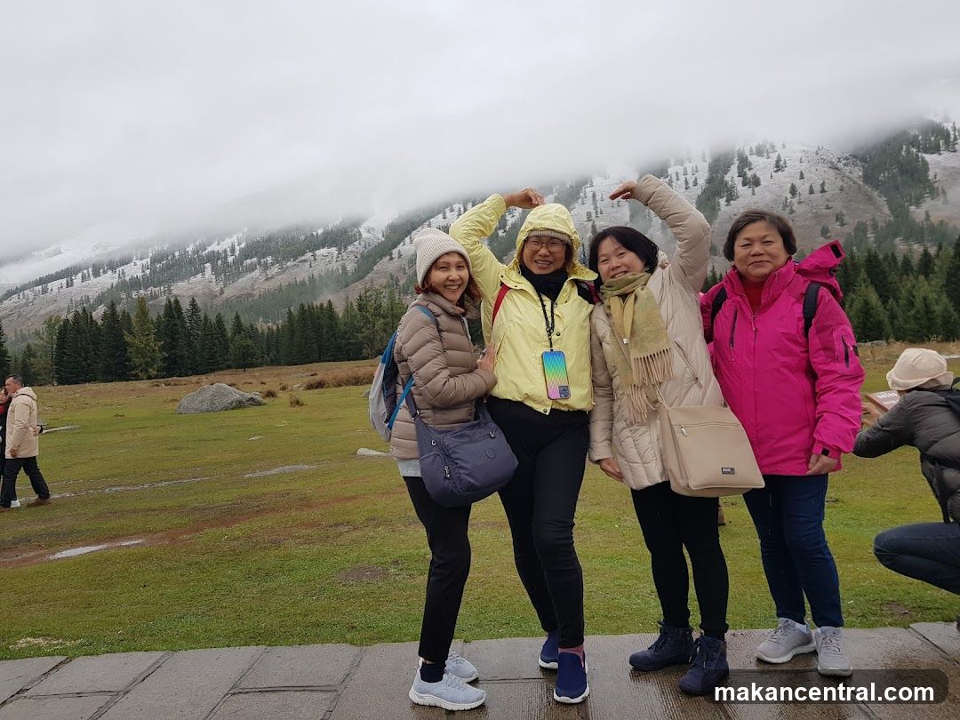 Group of women posing in mountainous landscape