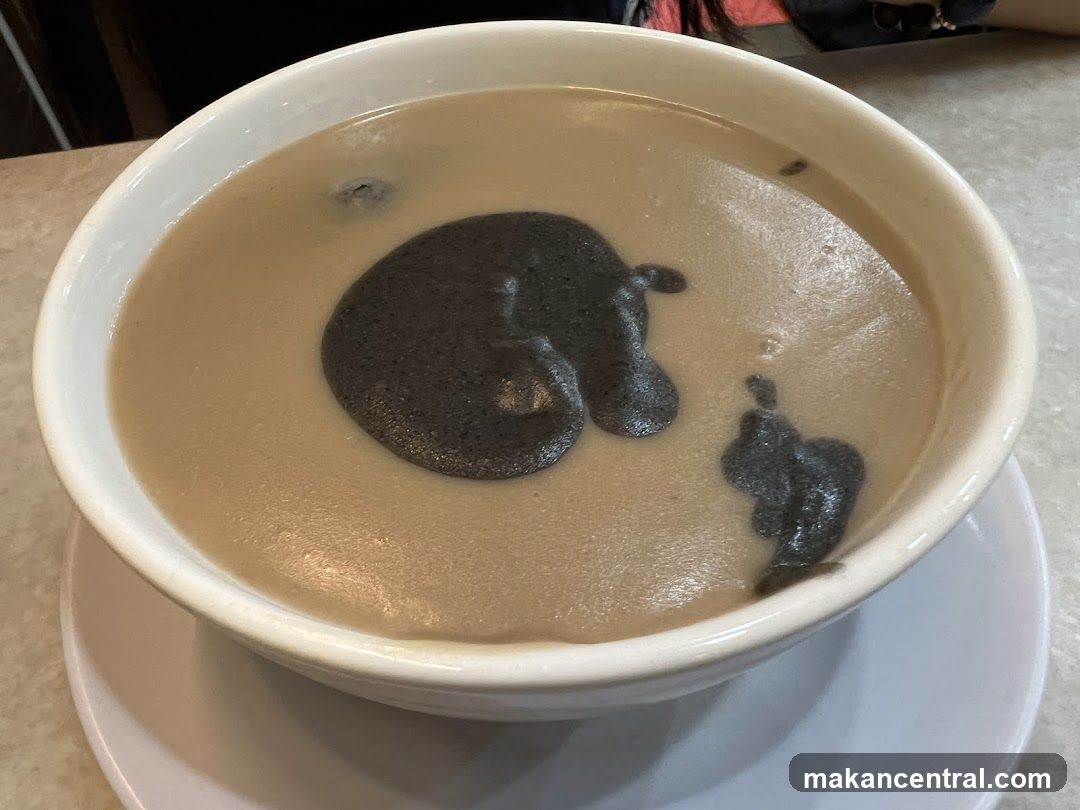 Bowl of soup with dark swirls