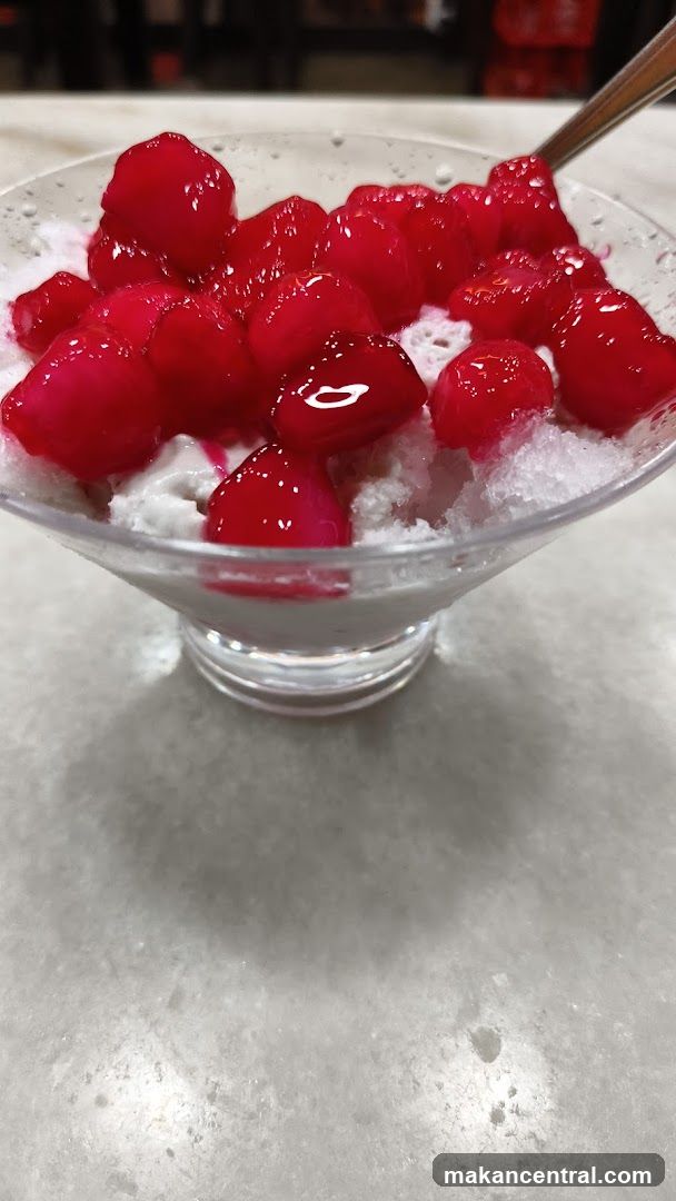 Ice dessert with red cherries