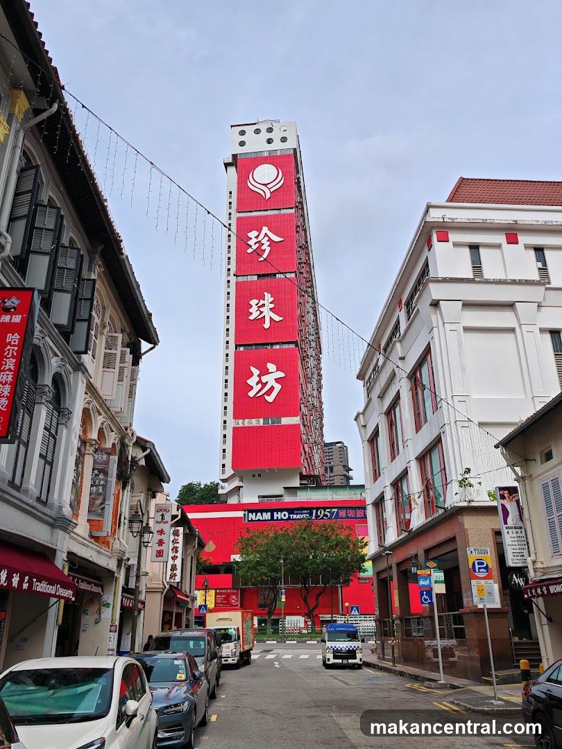 Street View with Red Signboard Building