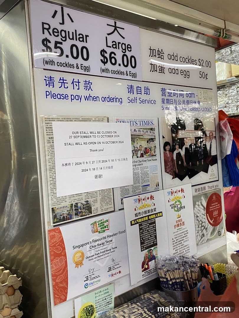 Food stall signage with closure notice and awards
