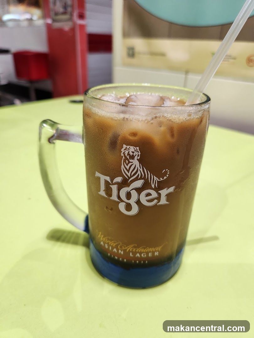 Iced beverage in Tiger mug