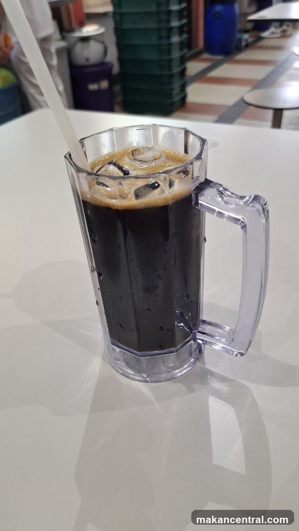 Iced beverage in transparent mug