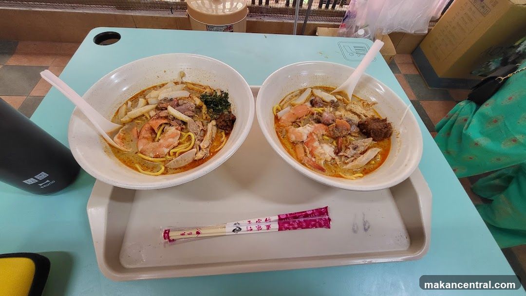 Two bowls of noodle soup on a tray