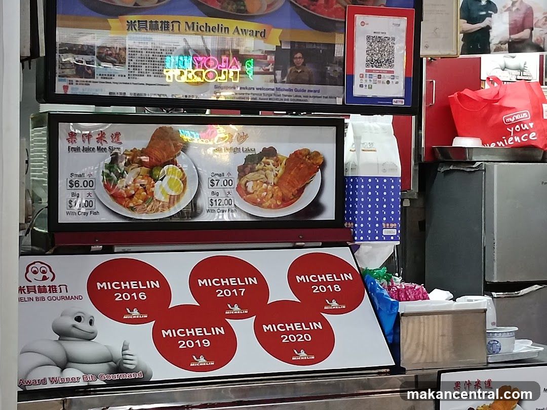 Michelin Award Display at Food Stall