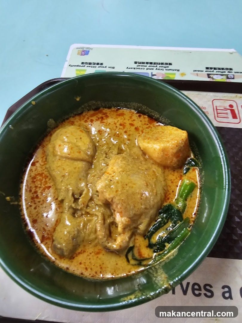 Curry dish in green bowl