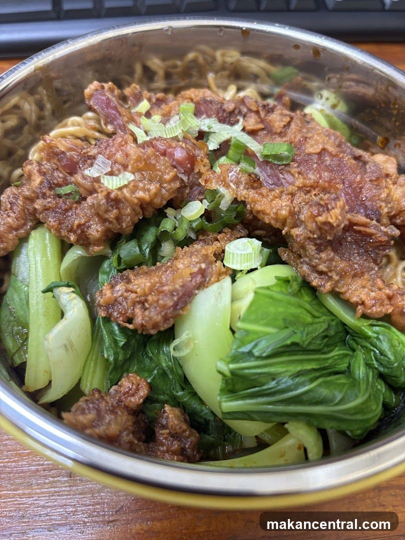Noodle Bowl with Fried Meat and Greens