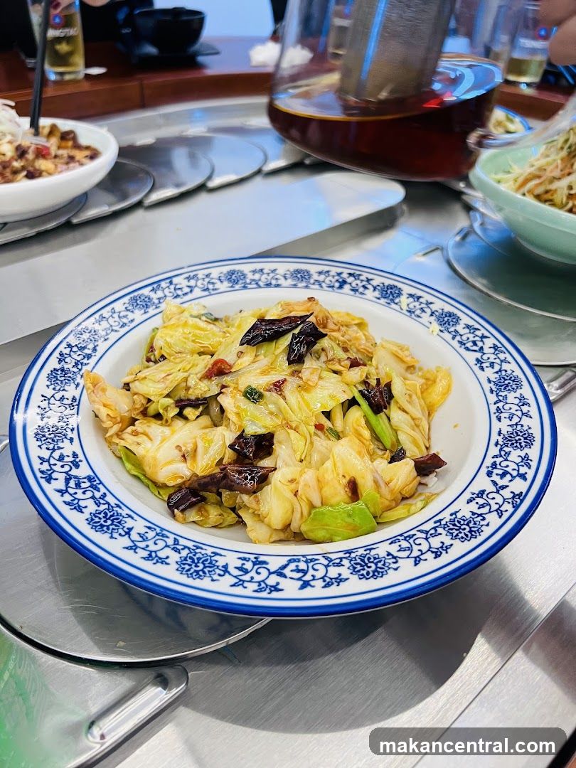 Dining Table with Stir-Fried Cabbage