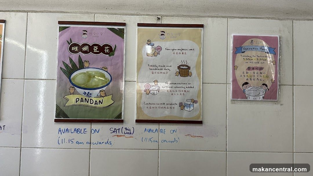 Wall-mounted promotional posters and operation hours