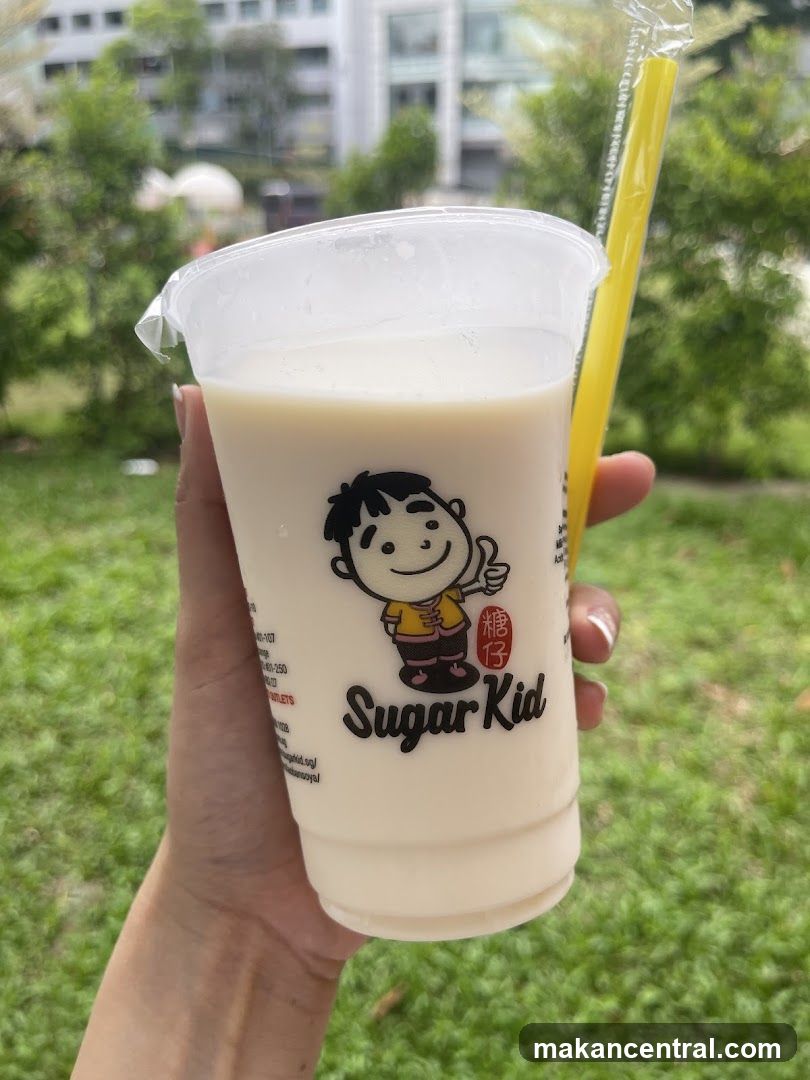 Sugar Kid drink held outdoors