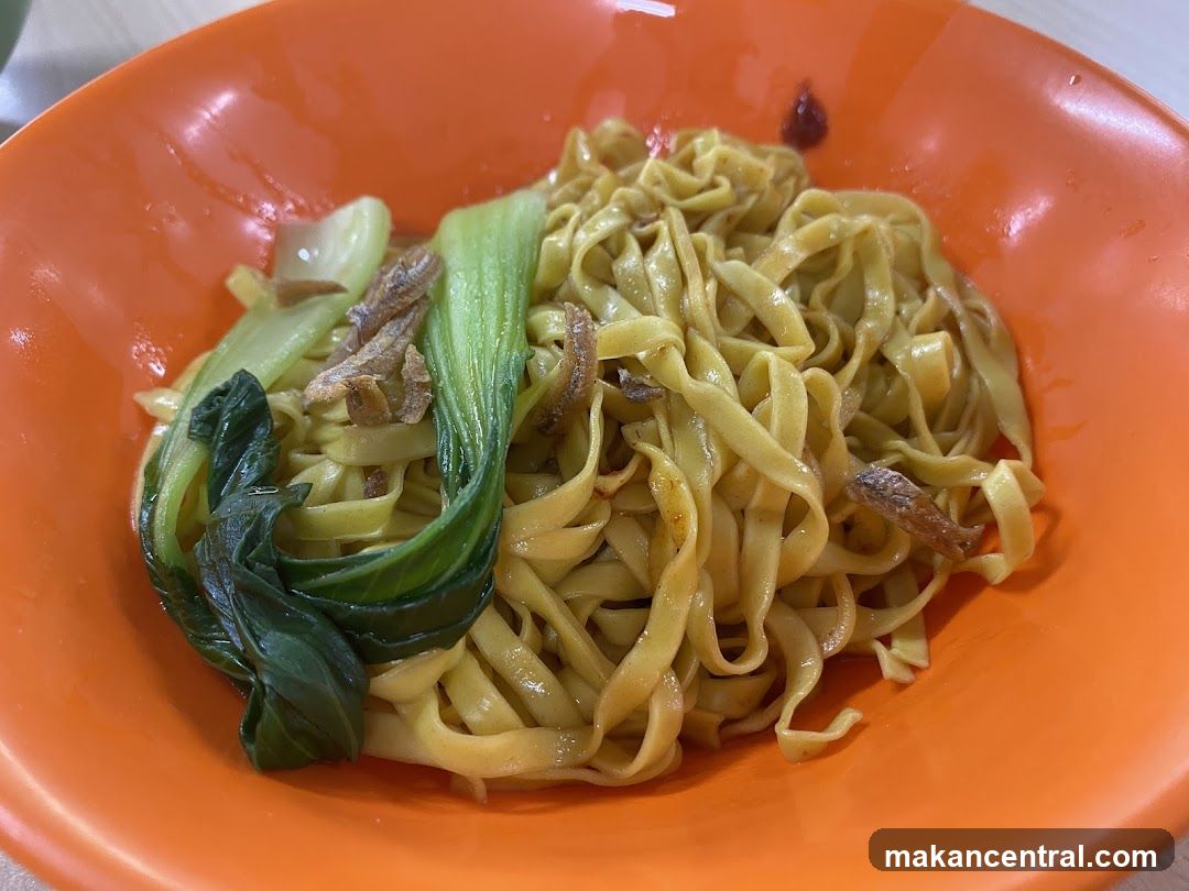 Noodles in orange bowl