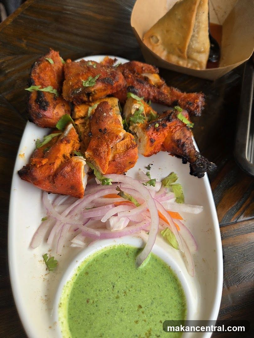 Food Plate with Grilled Chicken and Accompaniments