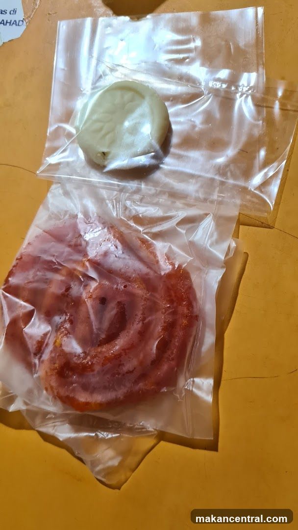 Two food items in plastic packaging