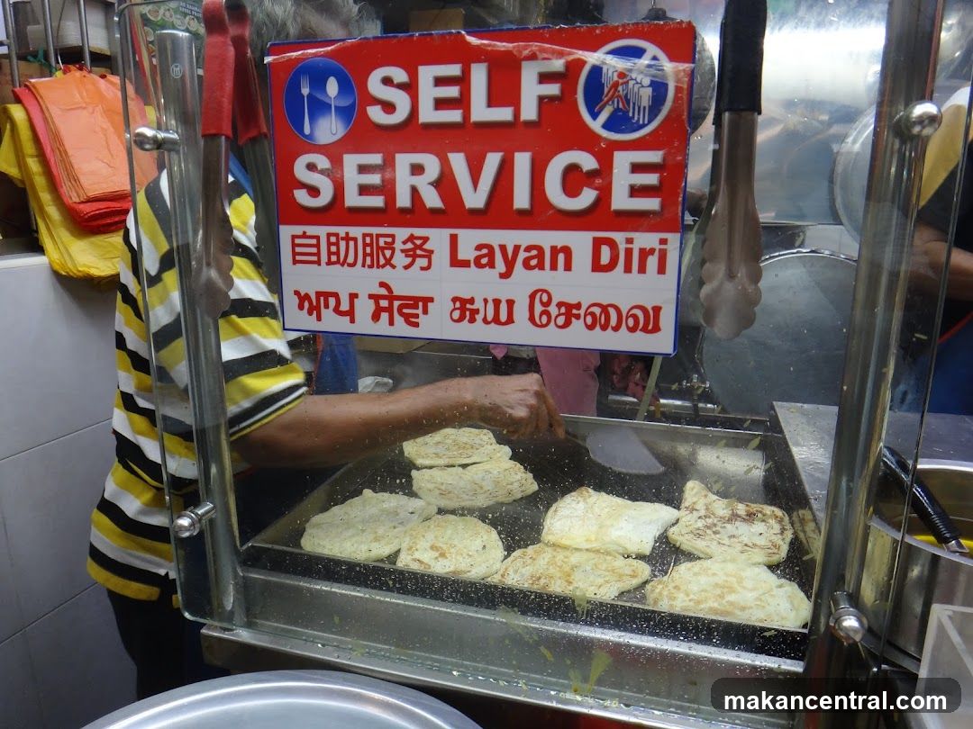 Roti Canai being cooked