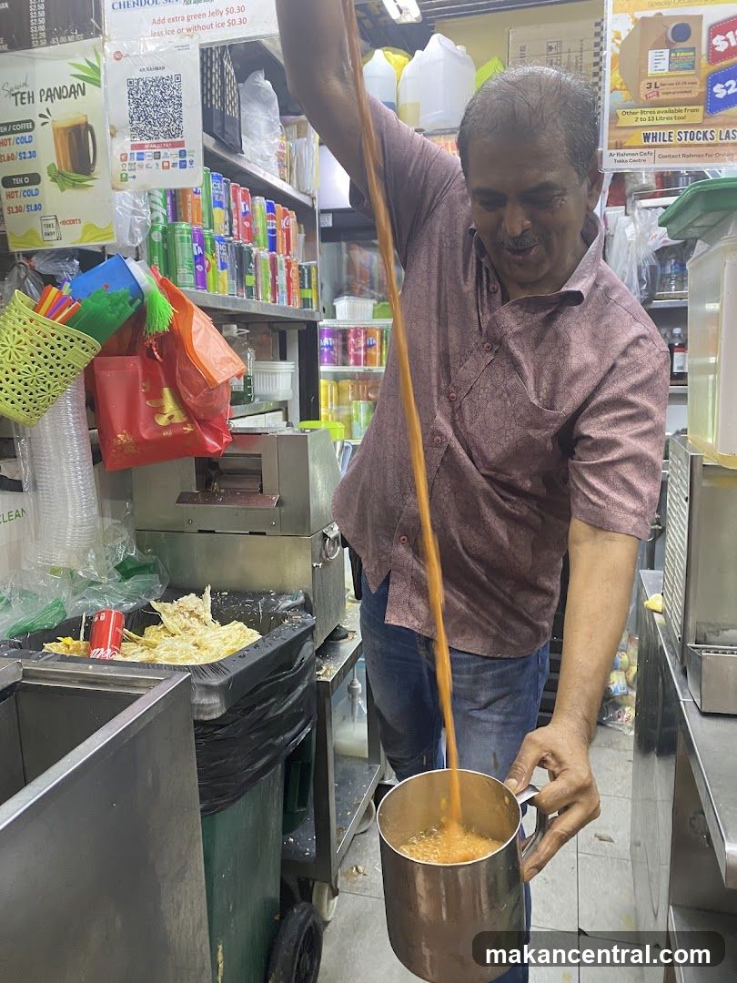 Man pouring tea