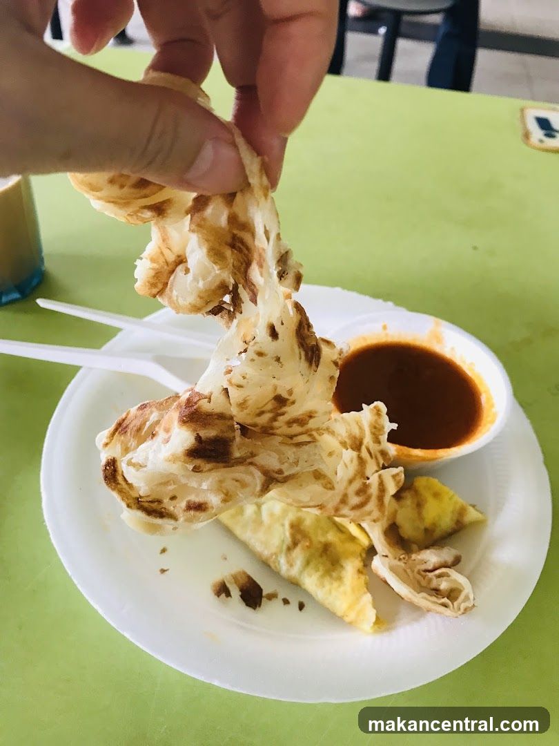 Roti Canai with Curry and Egg