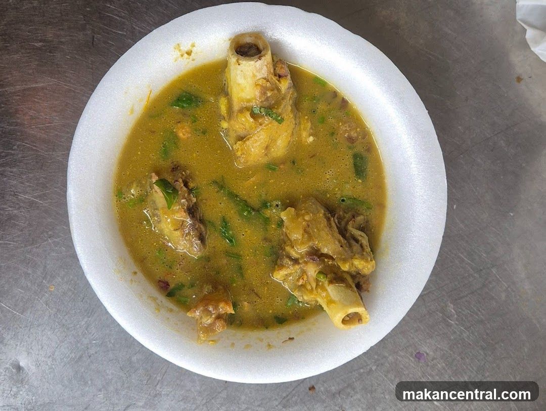 Bowl of Soup with Meat and Bones