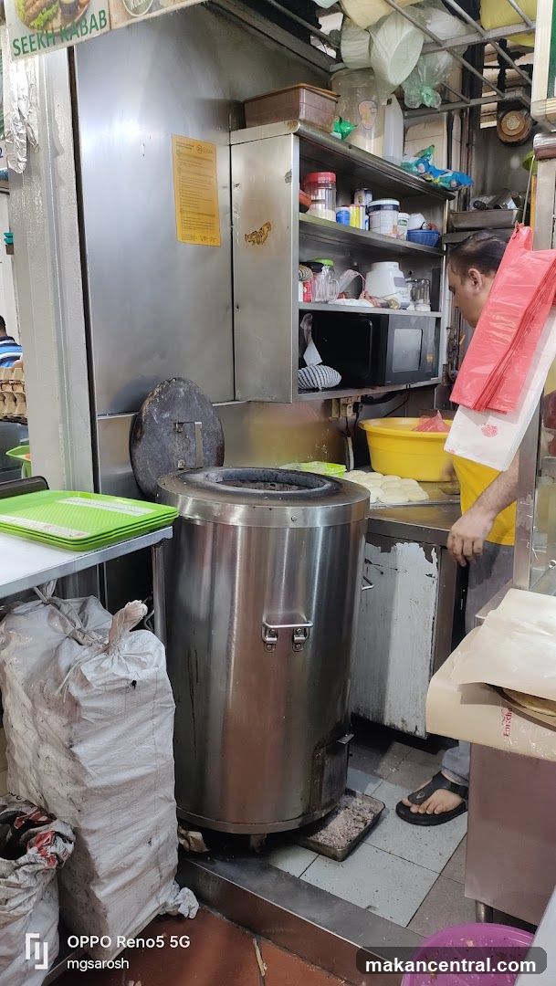Kitchen Scene with Tandoor Oven