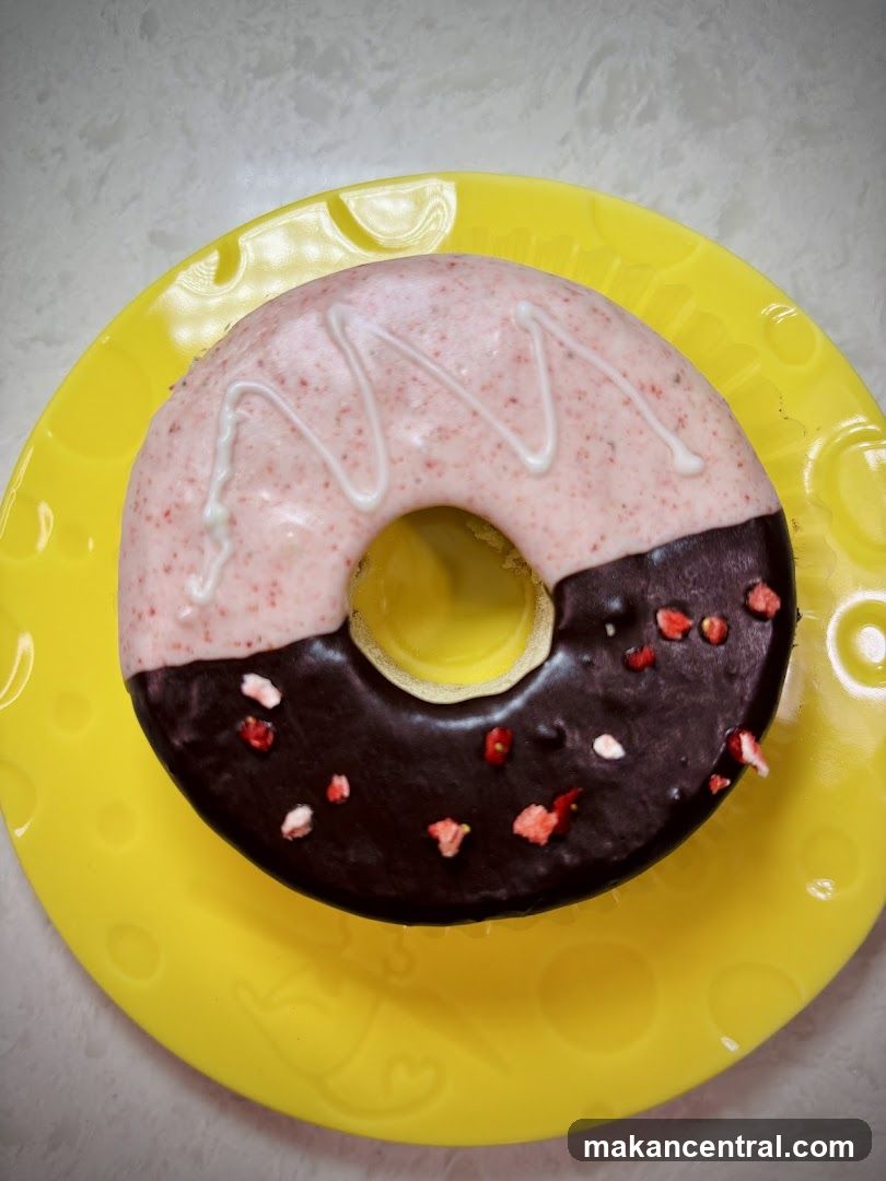 Donut on a yellow plate