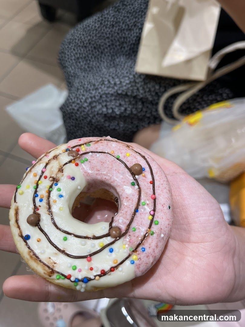 Donut with Pink and White Icing