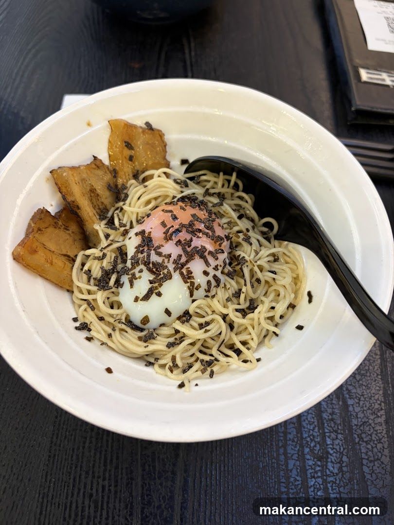 Bowl of Noodles with Egg and Pork Belly