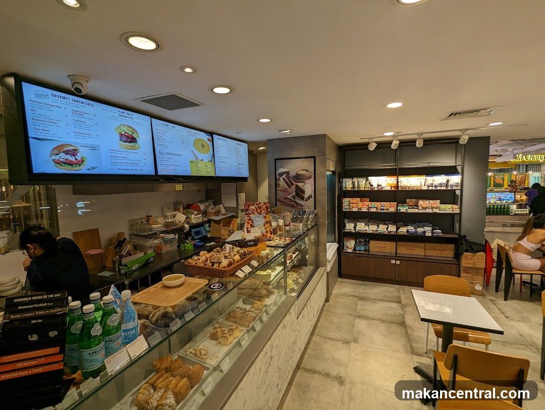 Cafe Interior with Menu Boards and Display Cases