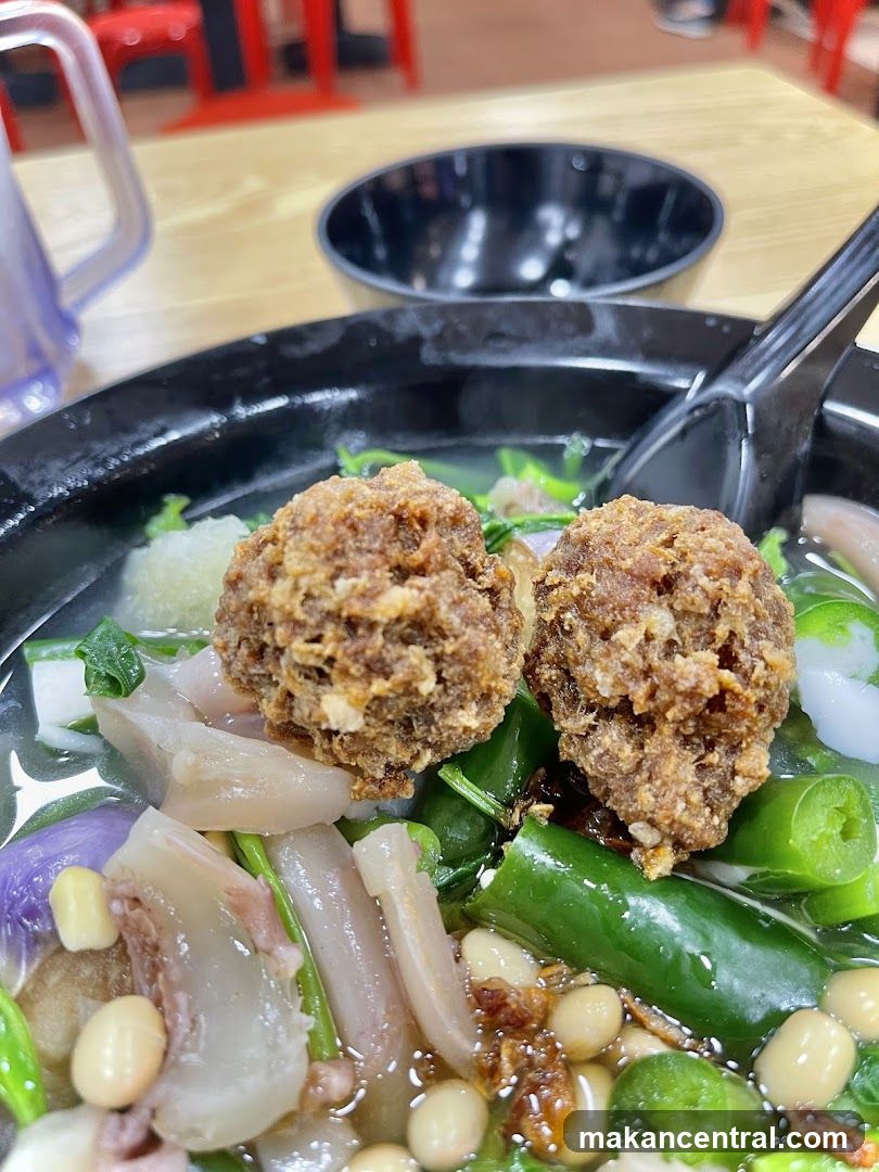 Bowl of Soup with Meatballs and Vegetables