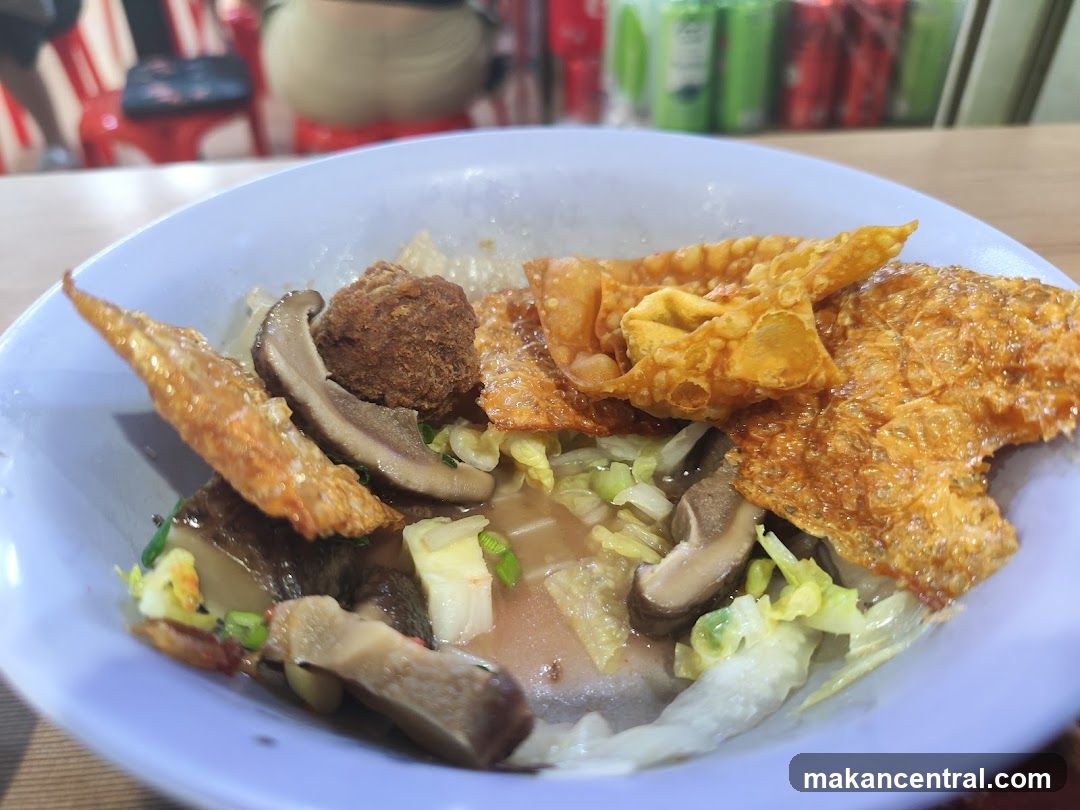 Noodle Soup with Fried Wontons and Mushrooms