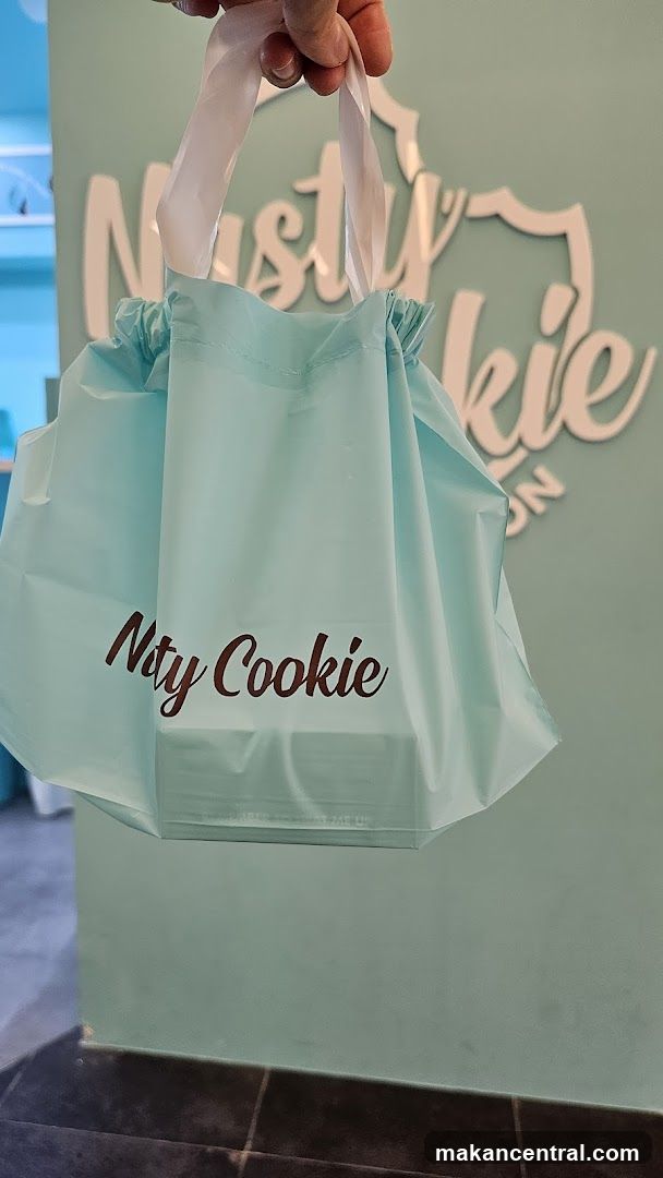 Light Blue Gift Bag with "Nuty Cookie" Logo