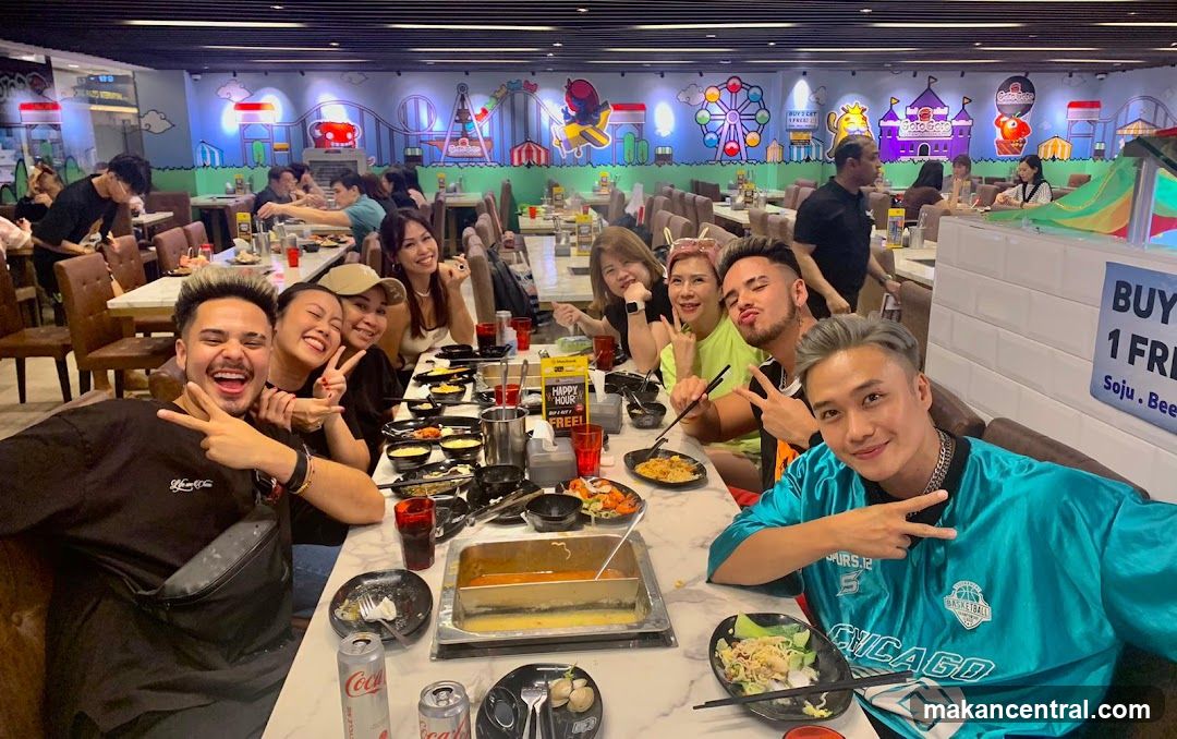 Group of friends enjoying a meal at a restaurant