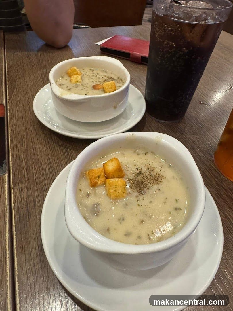 Creamy Soup with Croutons and a Drink