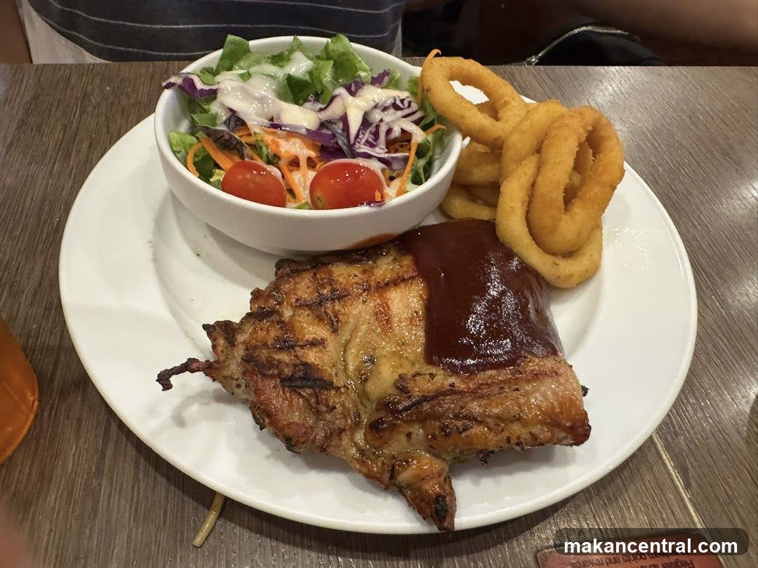 Grilled Ribs with Salad and Onion Rings