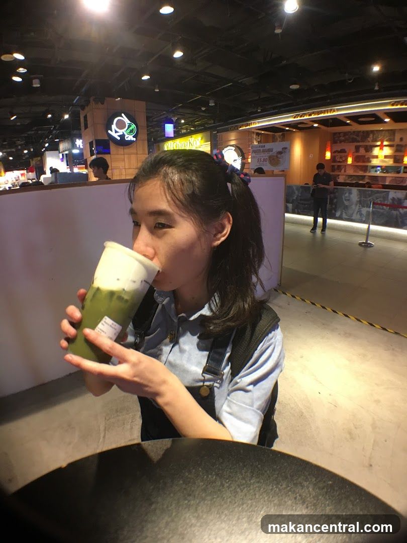 Woman drinking a beverage