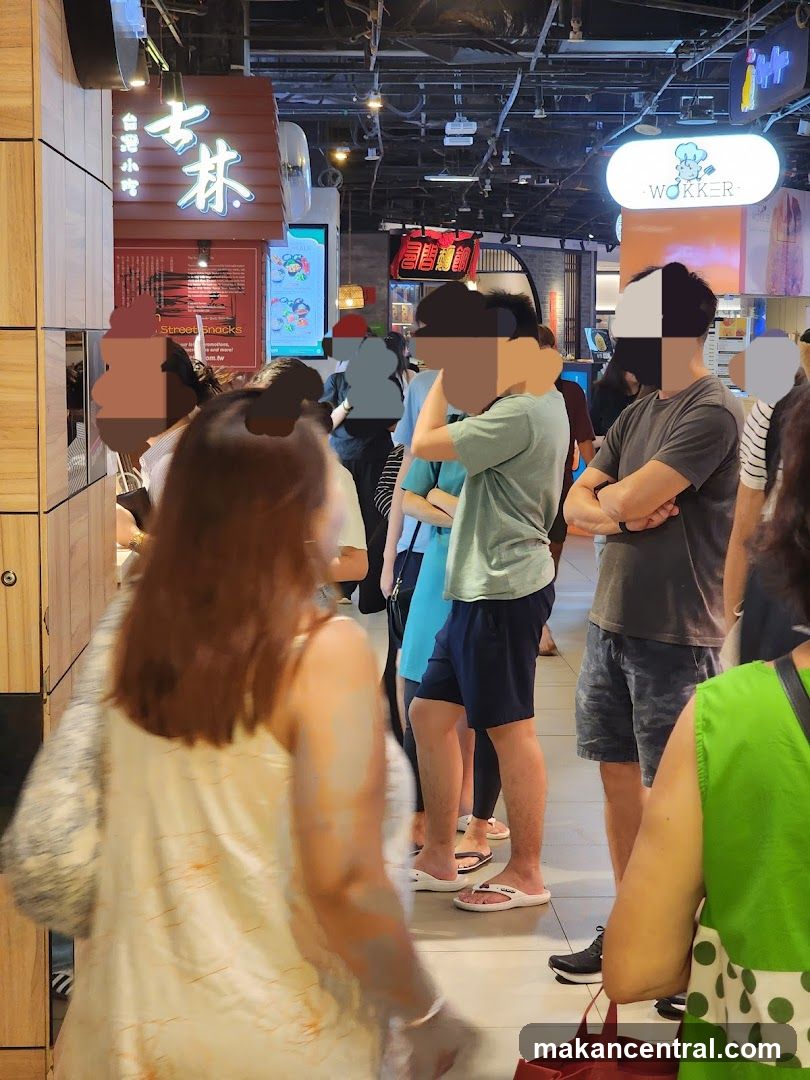 Food court with various stalls and customers