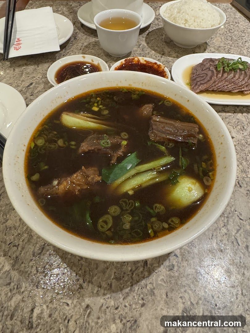 Beef noodle soup with side dishes