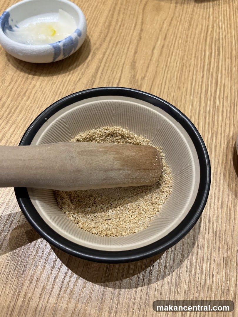 Sesame seeds being ground