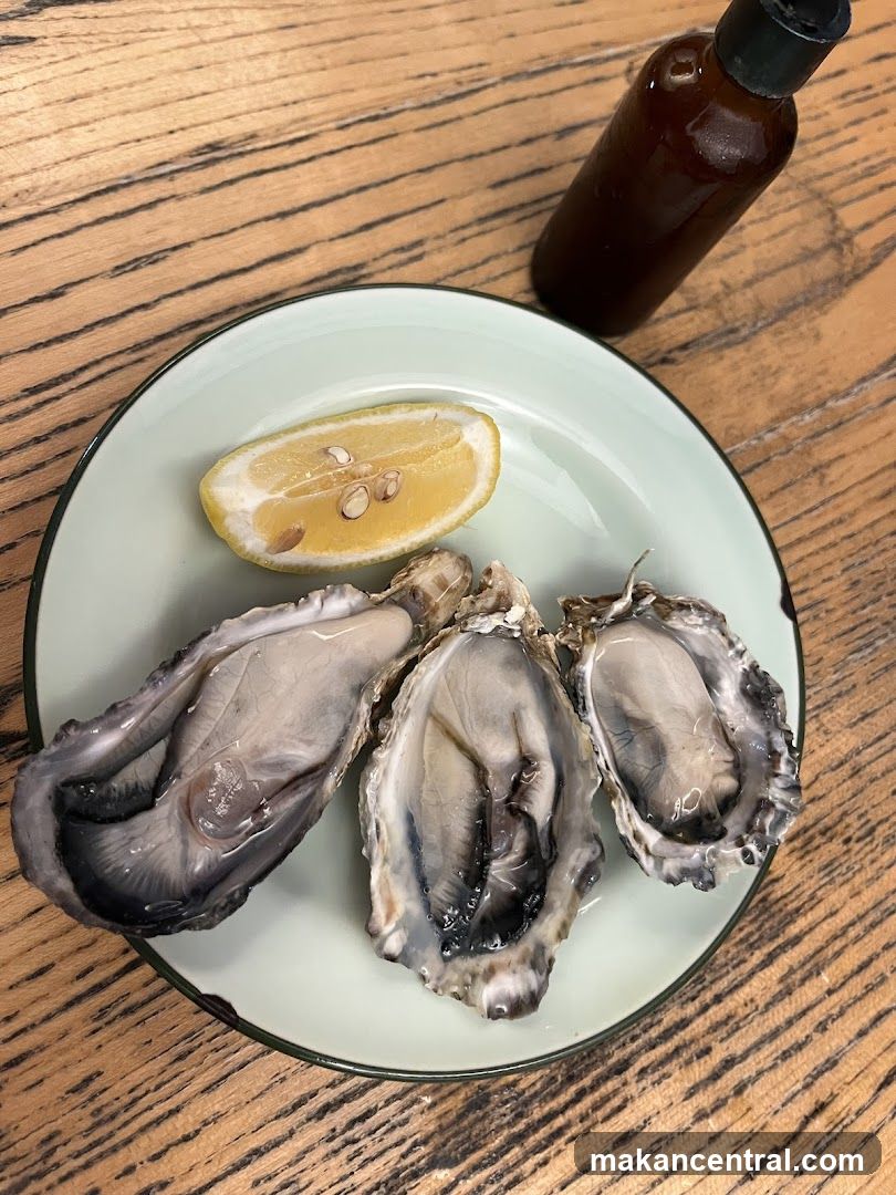 Oysters with Lemon and Sauce