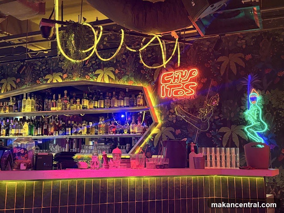 Bar Interior with Neon Signs