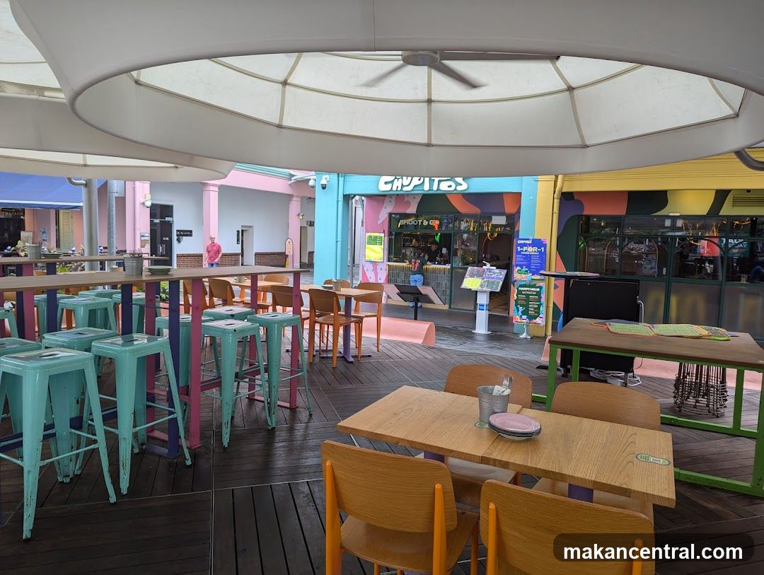 Outdoor Seating Area with Colorful Facade