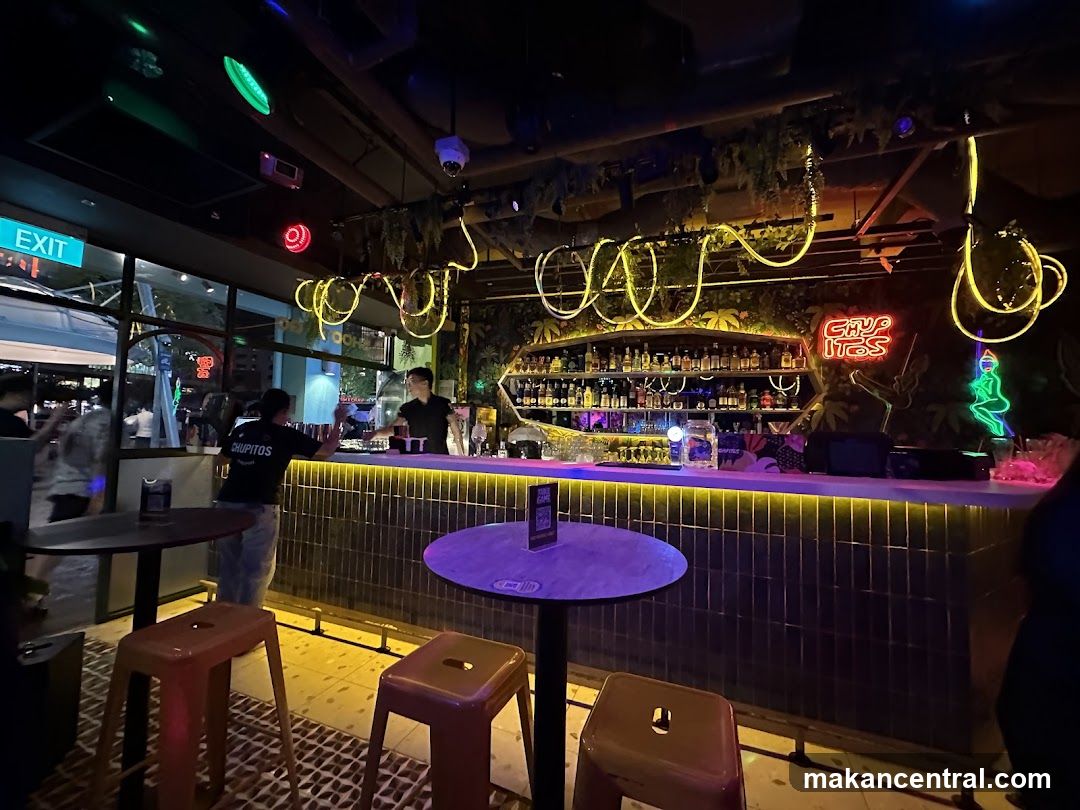 Bar Interior with Neon Signs