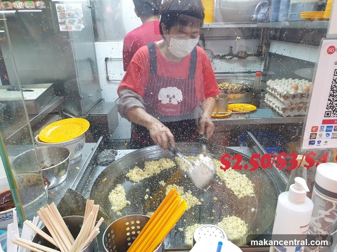 Food stall vendor cooking