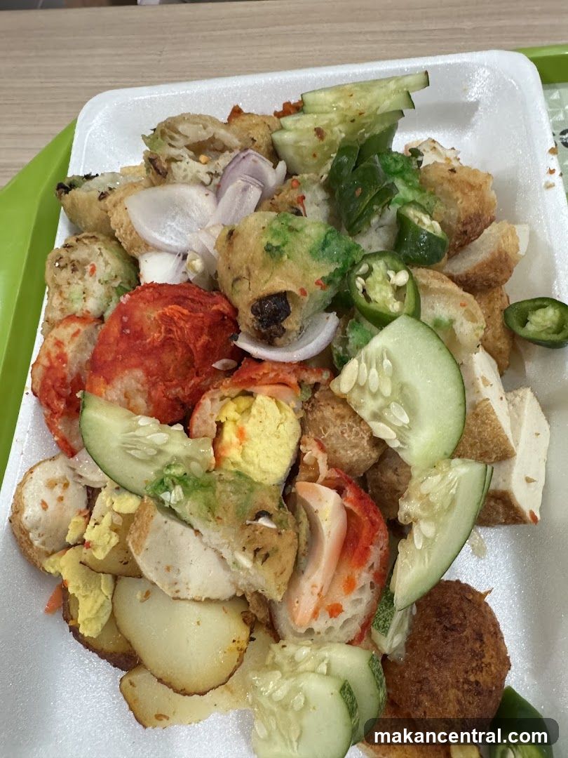 Assorted Fried Snacks with Cucumber and Onion