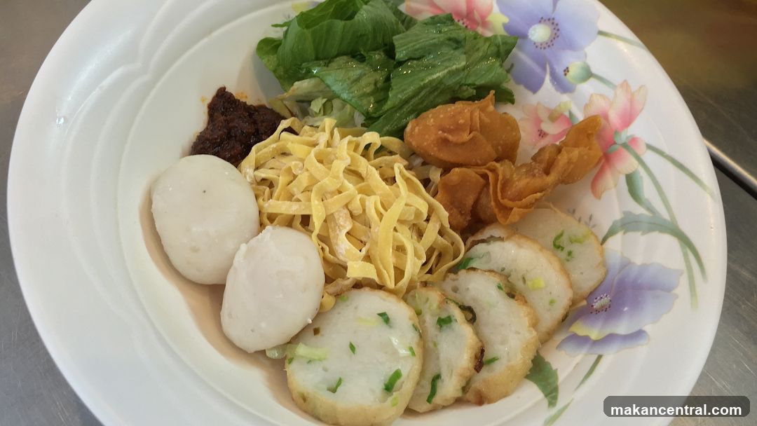 Noodle Dish with Fish Balls and Wontons