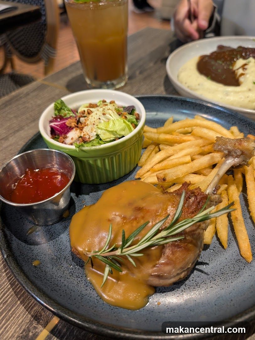 Duck Confit with Fries and Salad